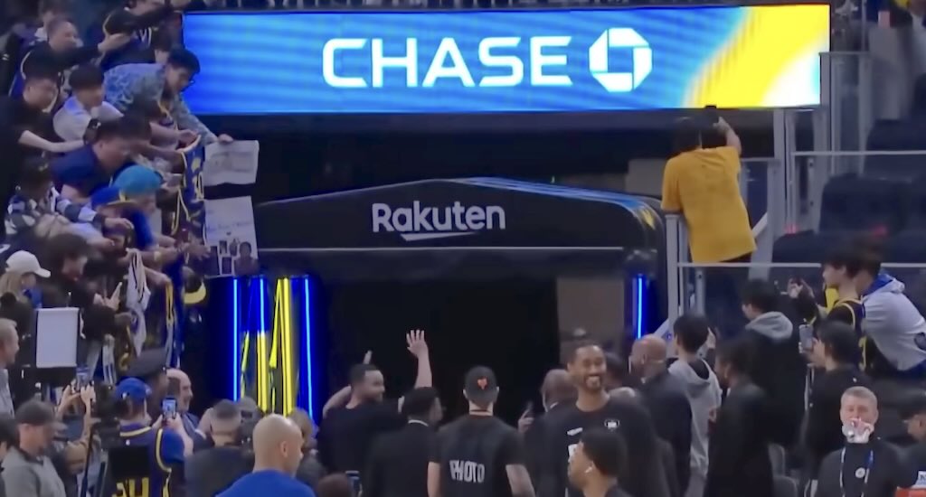 Golden State Warriors retractable players tunnel LED lights stephen curry celebrates landing shot from tunnel